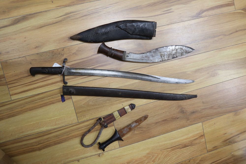 A WWI bayonet, a kukri and a dagger